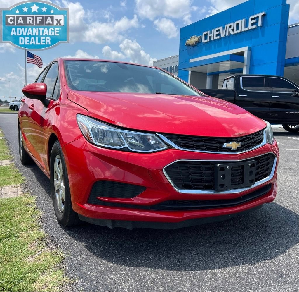 2017 Chevrolet Cruze LS in Red Hot — front three-quarter view