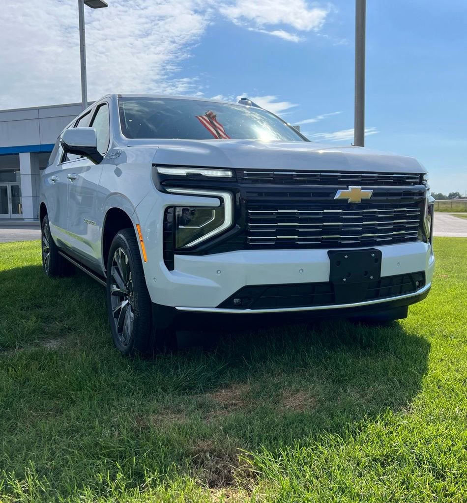 2026 Chevrolet Suburban High Country in Polar White Tricoat — front three-quarter view