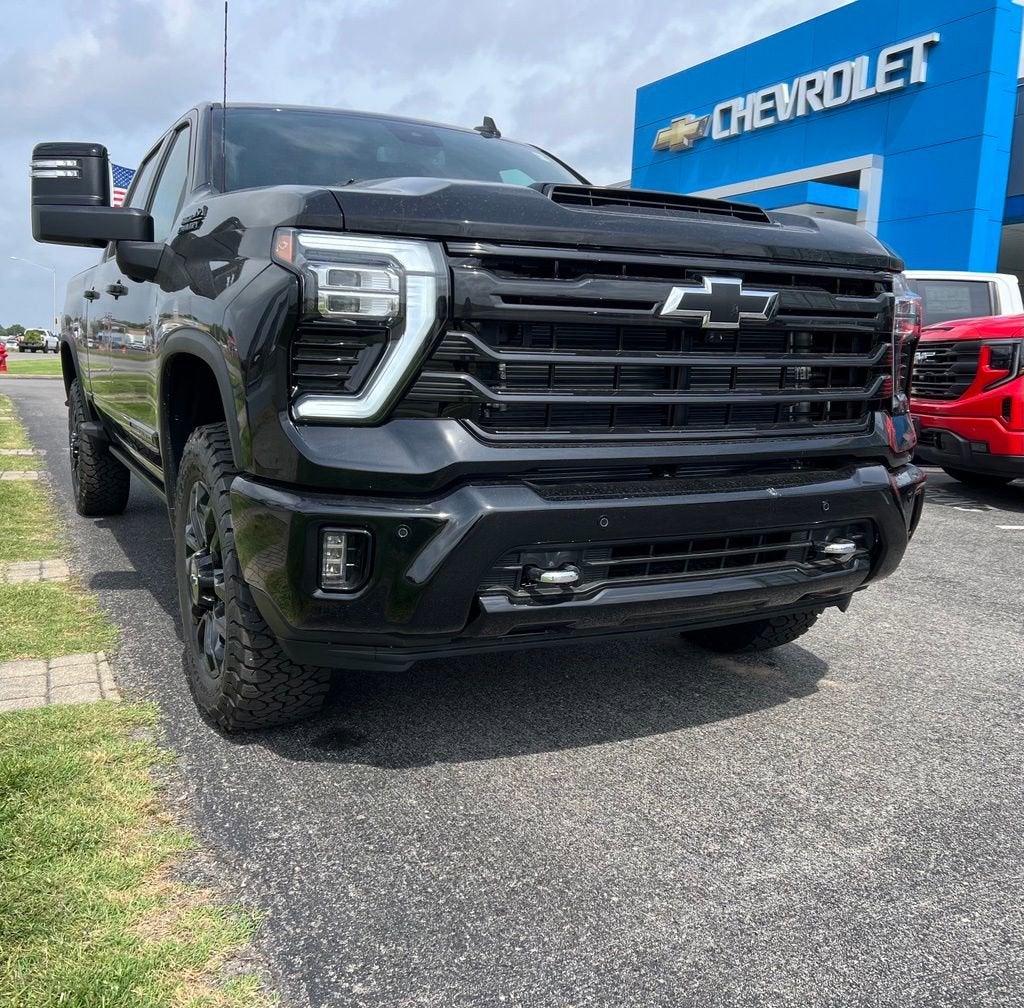 2026 Chevrolet Silverado 2500 HD High Country in Black — front three-quarter view