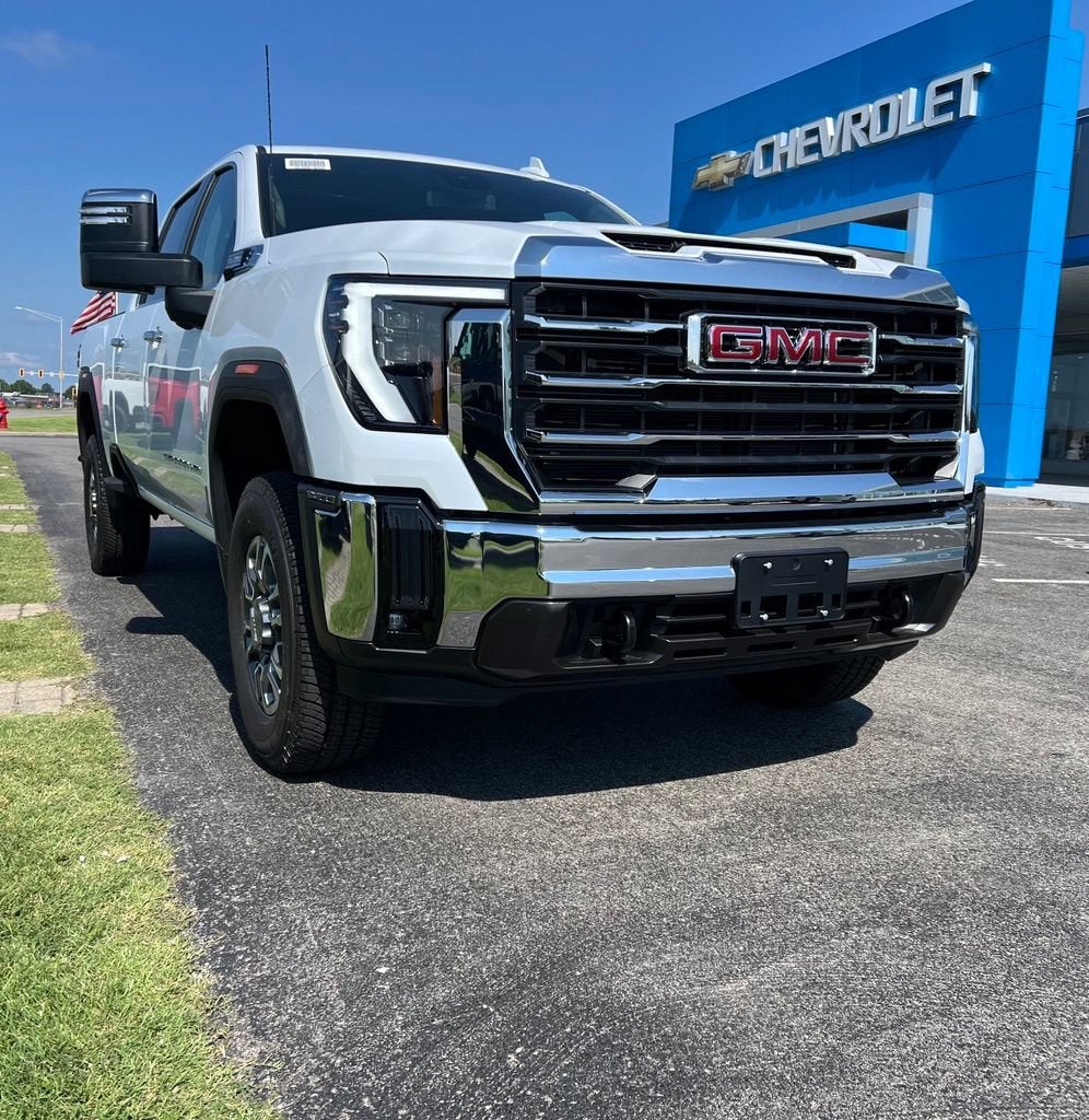 2026 GMC Sierra 2500 HD SLT in Glacier White Tricoat — front three-quarter view