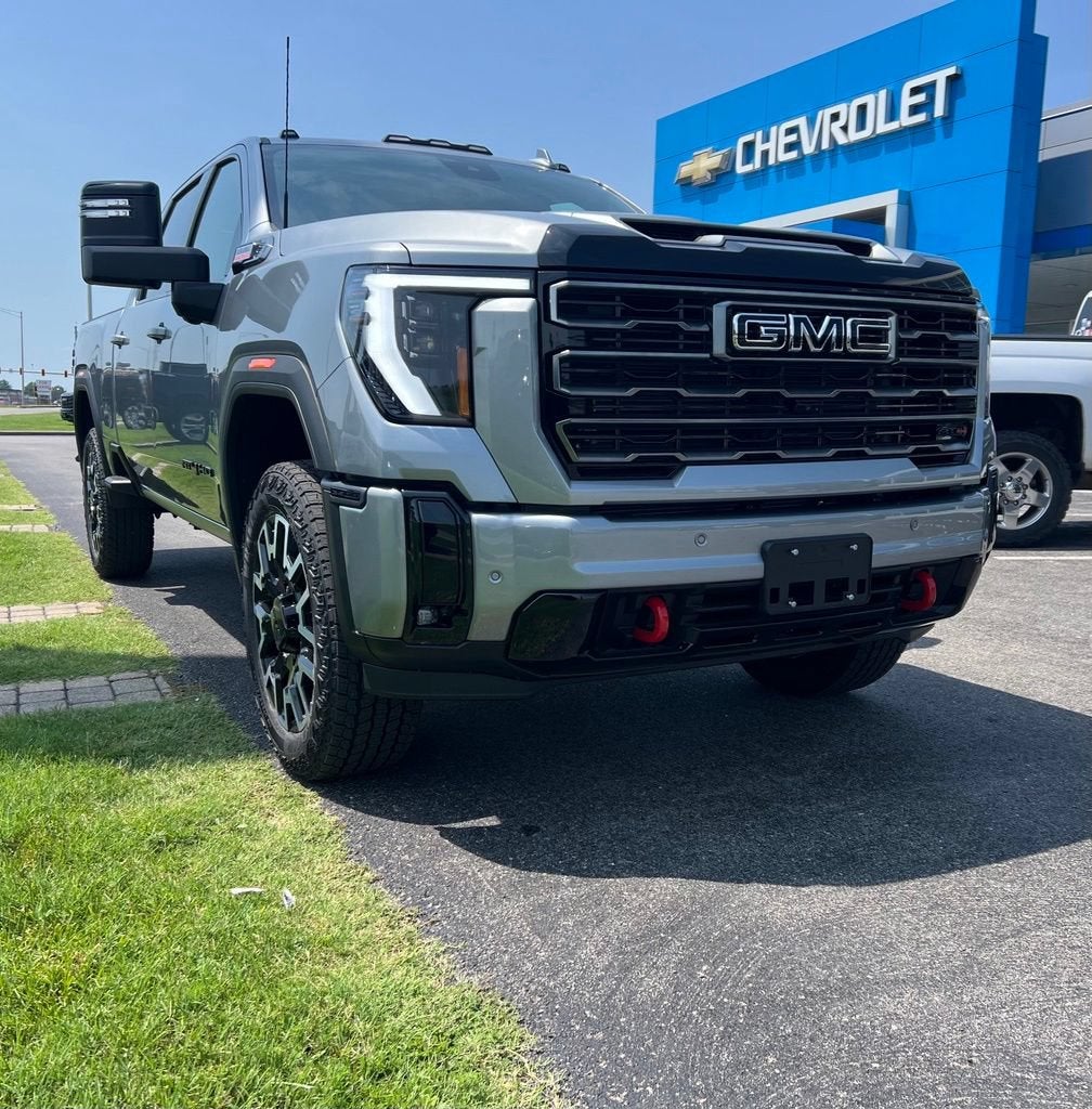 2026 GMC Sierra 2500 HD AT4 in Sterling Metallic — front three-quarter view