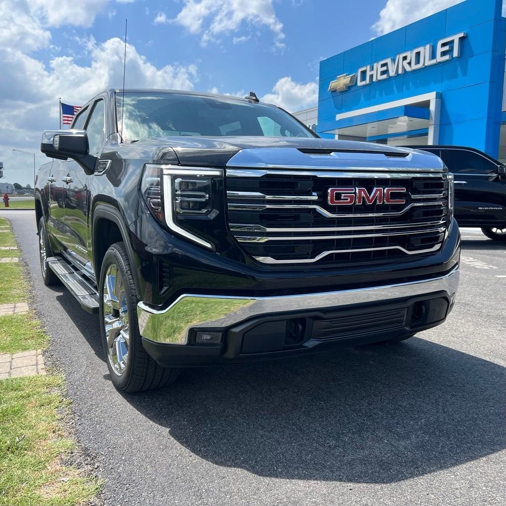 2026 GMC Sierra 1500 SLT in Onyx Black — front three-quarter view